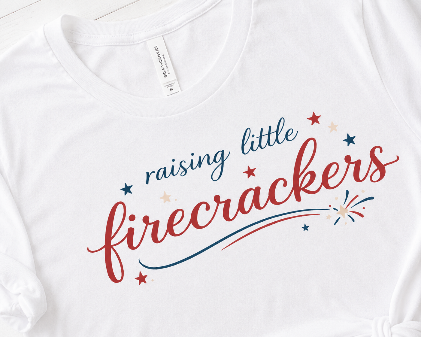 Mama Raising Little Firecrackers™ Bella+Canvas Tee